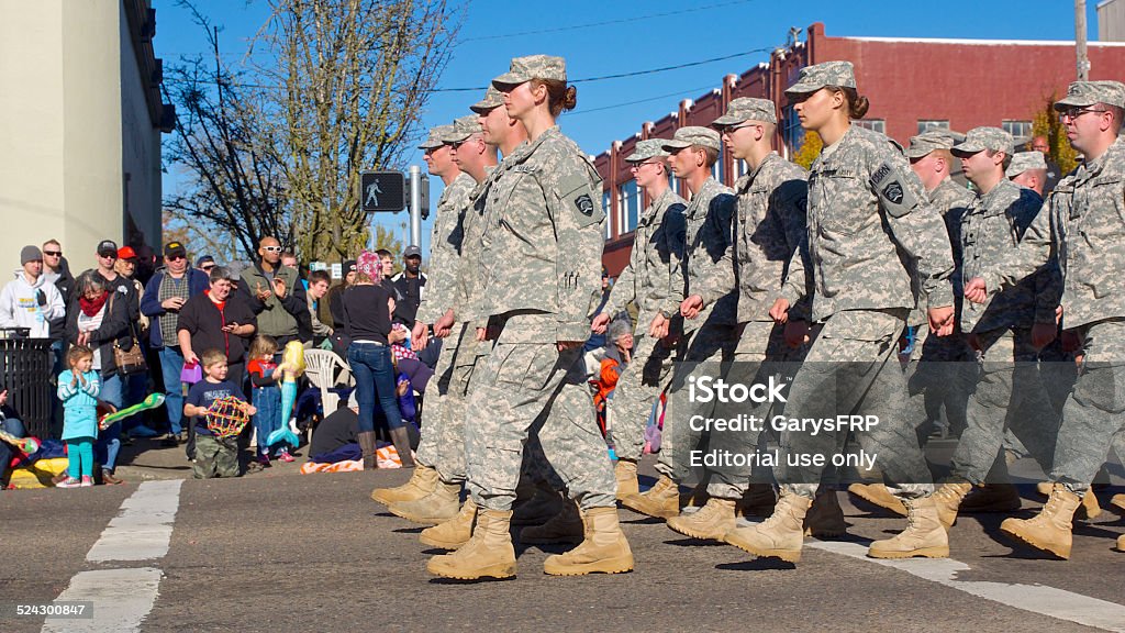 Veterans Day Parade Albany Oregon National Guard 82 Brigade Albany, Oregon, USA - November 11, 2014 : This part of the parade on Lyon Street and 2nd Ave shows soldiers of the Oregon National Guard : Oregon National Guard 82 Brigade marching. Some of the large crowd of people are seen in the background. This large Veteran's Day Parade is held annually in Albany, Oregon. National Guard Stock Photo