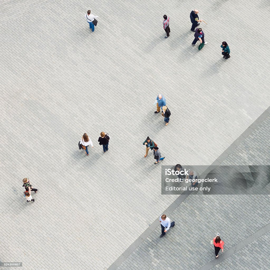 Multiple pedestrians from directly above Birmingham, UK - September 1, 2012: View from directly above of people on a pedestrianised street in central Birmingham, in England's West Midlands. High Angle View Stock Photo