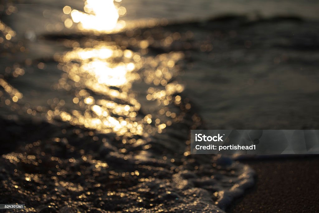 sunset sea bokeh sunset defocused beach and waves Backgrounds Stock Photo