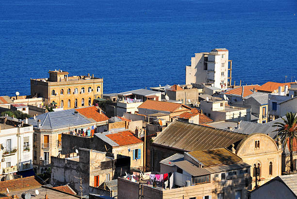 Algiers / Alger - Algeria / Algérie: Bologhine ibn Ziri commune, assorted buildings along the Mediterranean coast - traditional roof top terraces with clothes lines - this quarter was called Saint Eugène in colonial times 