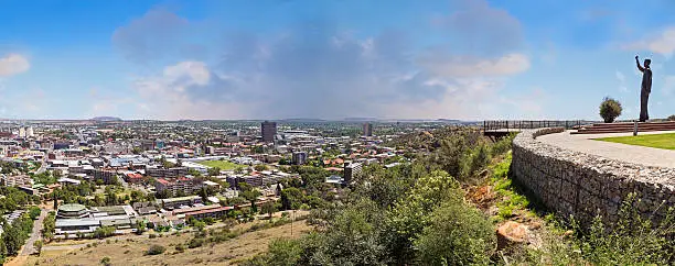 Bloemfontein city panorama, with Nelson Mandela seen overlooking the city below.