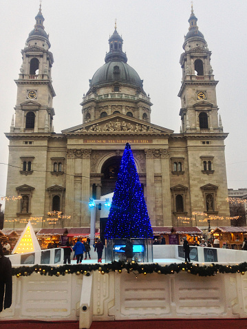 Budapest, Hungary - December 18, 2013: People ice skaing in front of St. Stephens Basilica in Budapest, Hungary.