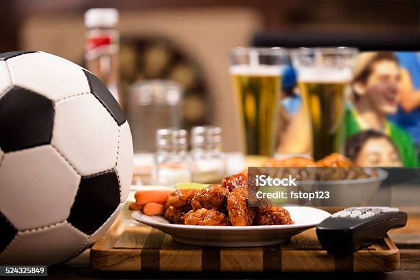 Watching Soccer Game On Television At Local Pub Chicken Wings Stock Photo - Download Image Now