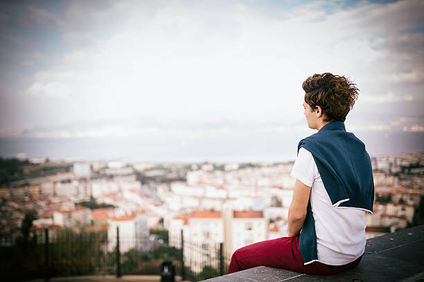 istock Handsome young man looking urban land scape 524326017