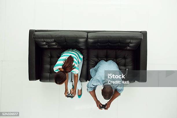 Above View Of Couple Playing Video Game Stock Photo - Download Image Now - Directly Above, Gamer, 20-24 Years