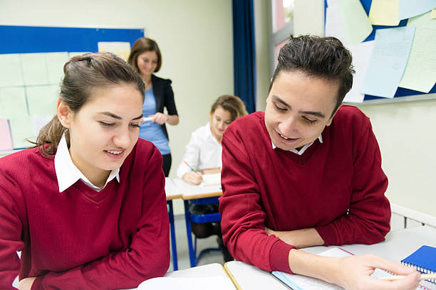 istock happy Turkish Students and Teacher Working Together, School, Istanbul 524326627