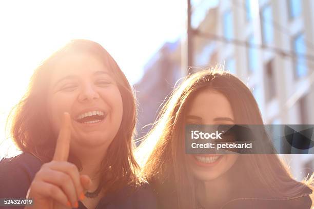 Best Friends Laughing In Street Stock Photo - Download Image Now - 18-19 Years, Adult, Adults Only