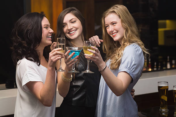istock Pretty friends having a drink together 524329145