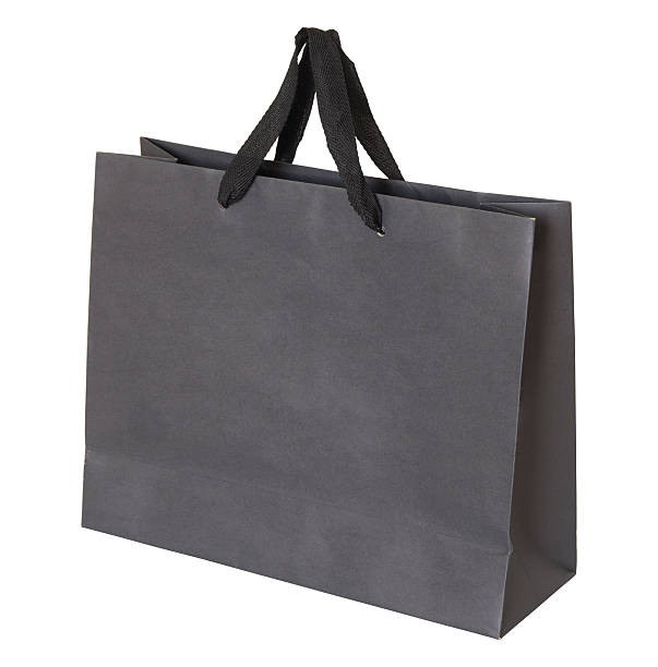 istock Gray paper bag isolated on white 524329975