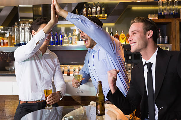 istock Handsome friends having a drink together 524368945