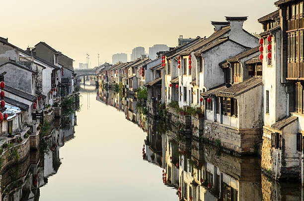 Water town in sunrise, Jiangsu Province, China Water town in sunrise, Jiangsu Province, China grand canal china stock pictures, royalty-free photos & images