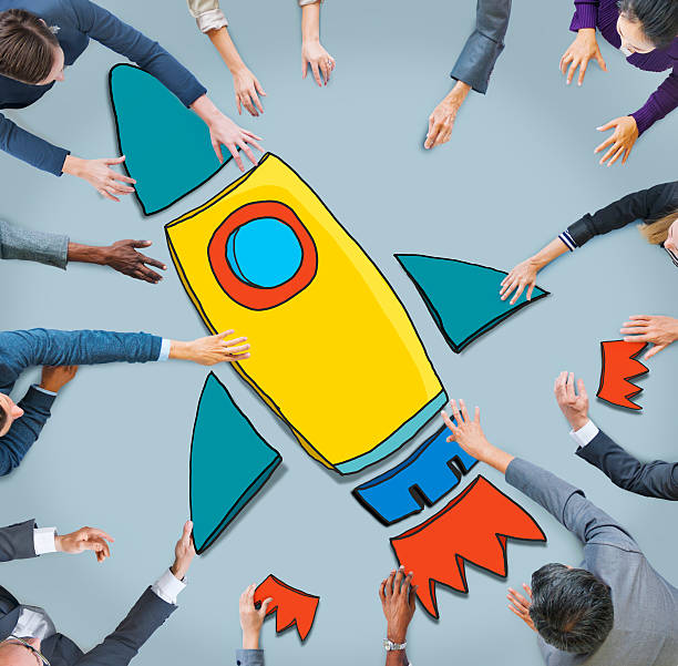 istock Group of Business People Reaching for Rocket Symbol 524370841