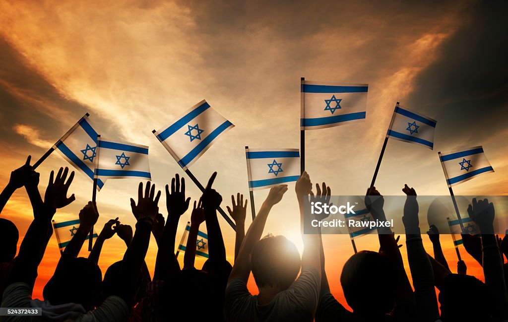 Group of People Waving the Flag of Israel Israeli Flag Stock Photo