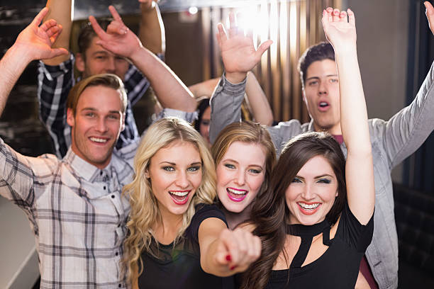 istock Stylish friends dancing and smiling 524372717