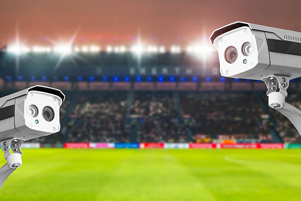 istock CCTV security in stadium football at twilight background. 524373086
