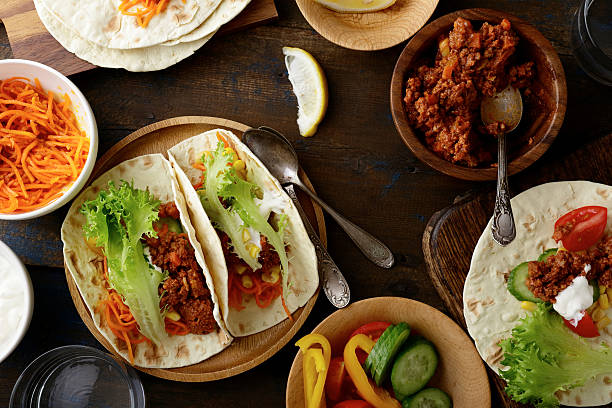 istock Mexican food - delicious Tacos with ground beef and vegetables 524374520