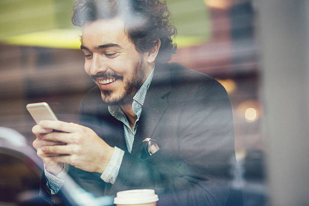 istock Man with a phone in a coffee shop 524374966