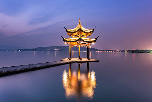 istock beautiful hangzhou twilight time and ancient pavilion 524377918