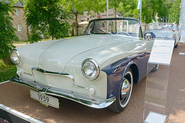 Jüchen, Germany - August 1, 2014: Volkswagen Rometsch Lawrence cabriolet 1959 front view. The car is on display during the 2014 Classic Days event at Schloss Dyck. People in the background are looking at the cars.