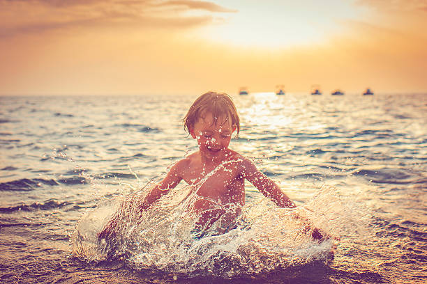 istock Child in the sea 524378906