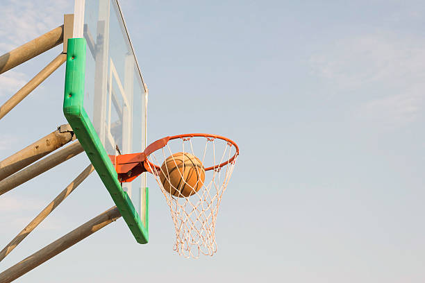 istock ball float over basketball net and goal 524381024
