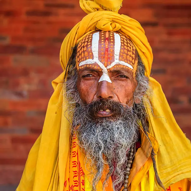 In Hinduism, sadhu, or shadhu is a common term for a mystic, an ascetic, practitioner of yoga (yogi) and/or wandering monks. The sadhu is solely dedicated to achieving the fourth and final Hindu goal of life, moksha (liberation), through meditation and contemplation of Brahman. Sadhus often wear ochre-colored clothing, symbolizing renunciation.http://bem.2be.pl/IS/nepal_380.jpg