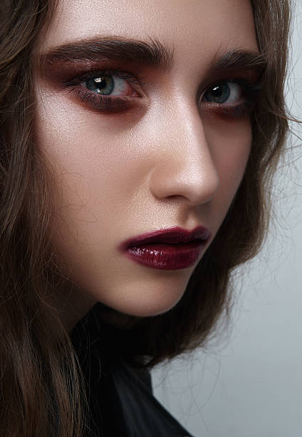 istock Beauty young female Rocker with dark red Makeup 524384836