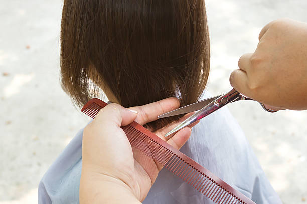 Girl hair cut. Asian girl cutting hair. short human hair women little girls stock pictures, royalty-free photos & images