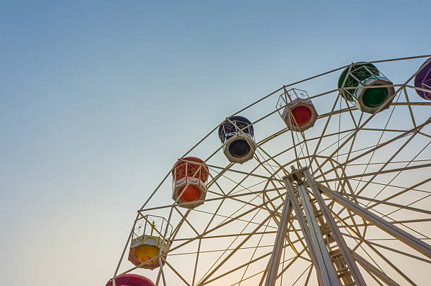 istock Ferris wheel on the background of sunset sky 524387936
