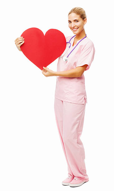 istock Portrait Of Nurse Holding Heart Shape 524388548