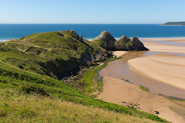 istock Three Cliff Bay the Gower Wales uk in summer 524388820