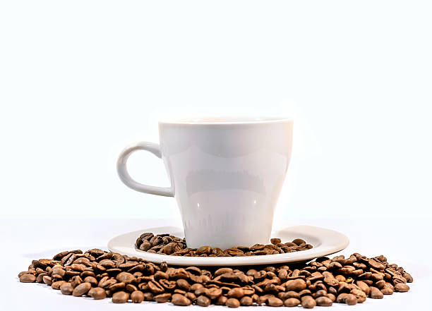 istock Cup of coffee with coffee beans, isolated on white background 524390568