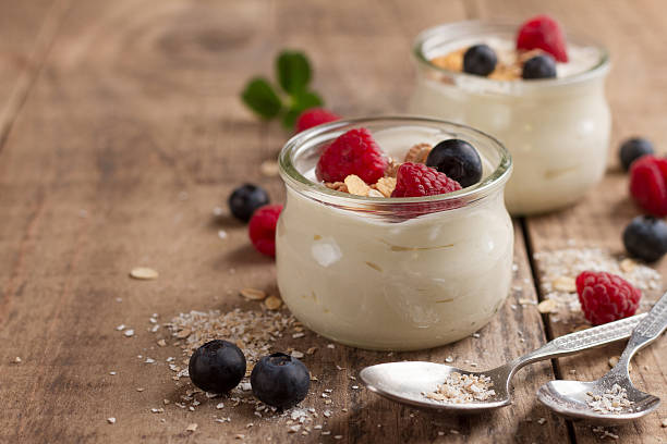 istock Yogurt with granola or muesli and fresh berries 524392140