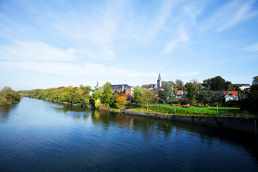 Autumn morning panorama of river Ruhr and Essen Kettwig at sunny day. Ruhrgebiet, North Rhine Westfalia.