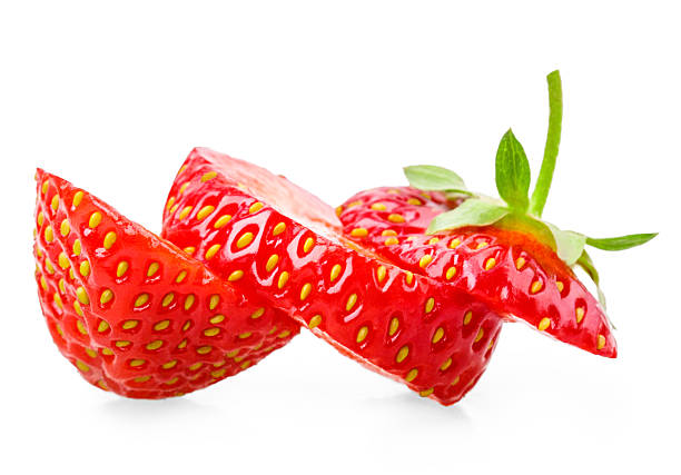 istock chopped strawberries isolated on white background 524397350