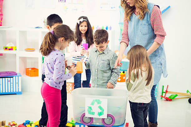 istock Cheerful Children Learning About Recycling in a kindergarden. 524397779