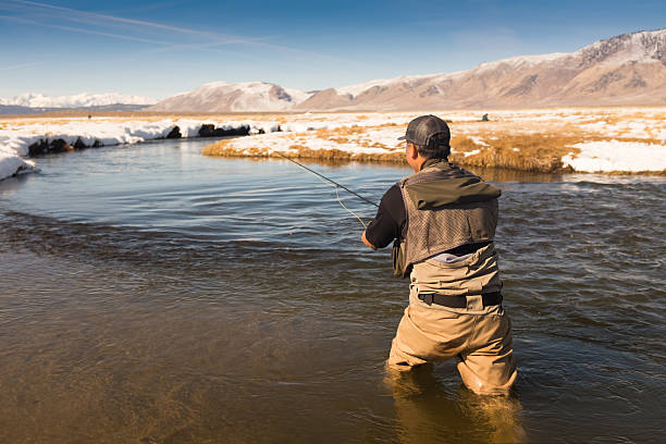 istock Winter Fly Fisherman 524399328