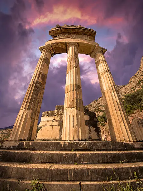 The Tholos at the sanctuary of Athena Pronoiat Delphi is a circular building that was constructed between 380 and 360 BCE. It consisted of 20 Doric columns arranged with an exterior diameter of 14.76 meters, with 10 Corinthian columns in the interior.