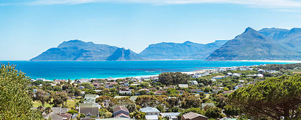 Kommetjie view in Cape Town Kommetjie bay view in Cape Town with residential homes overlooking the sea. kommetjie stock pictures, royalty-free photos & images