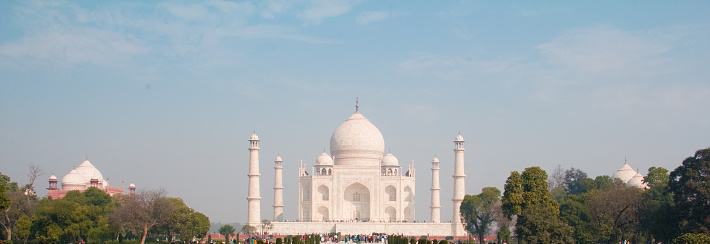 Agra,India-March 23,2023: The people visit Taj Mahal in Agra, India.This is one of the most recognizable structures in the world.Taj Mahal became a UNESCO World Heritage Site and was cited as the jewel of Muslim art in India.