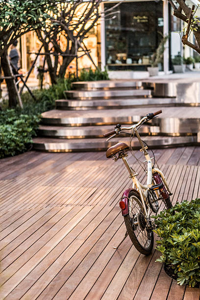 istock Bicycle parking on a wooden plank floor 524402727
