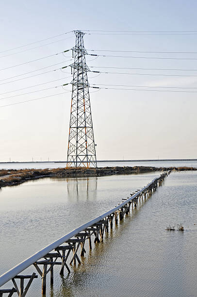 istock Pylon and simple reflection in the water pipe equipment 524426919