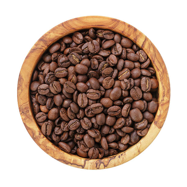 istock roasted coffee beans in olive wood bowl 524429049