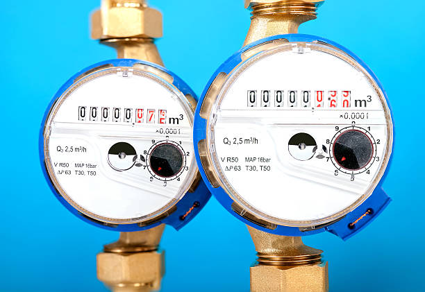 istock Water meters, sanitary equipment on blue background. 524429143