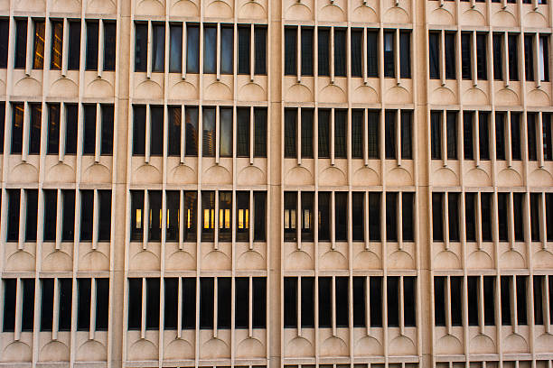 istock Closeup of old office building windows 524429441