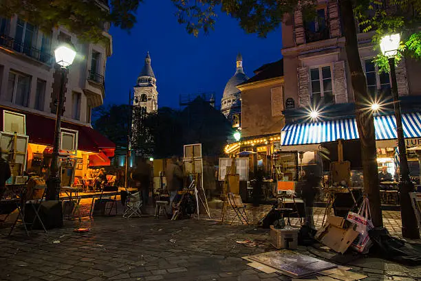 Photo of Montmartre famous artist painting spot at night in Paris, France