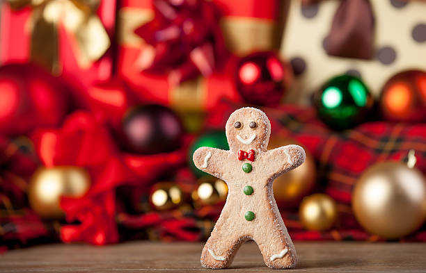 istock Cookie man and christmas gifts 524449303