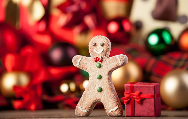 istock Cookie man and christmas gifts 524449305