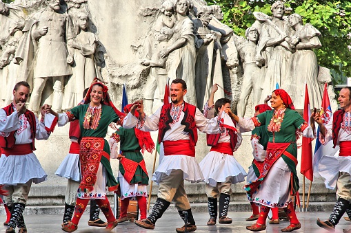 Budapest, Hungary - June 19, 2014: Bulgarian folk dance group JANTRA performs on street in Budapest. The group performs since 1996.