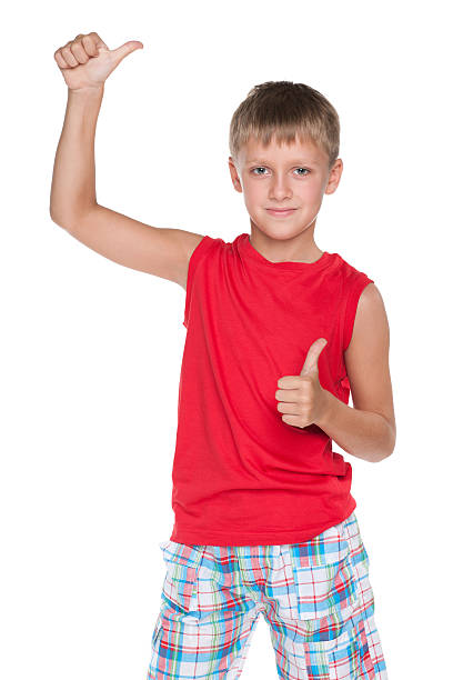 istock Handsome young boy with his thumbs up 524452097